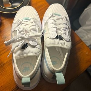 Nike Court Vision Alta in the color white/light dew and are a size 8.5W.